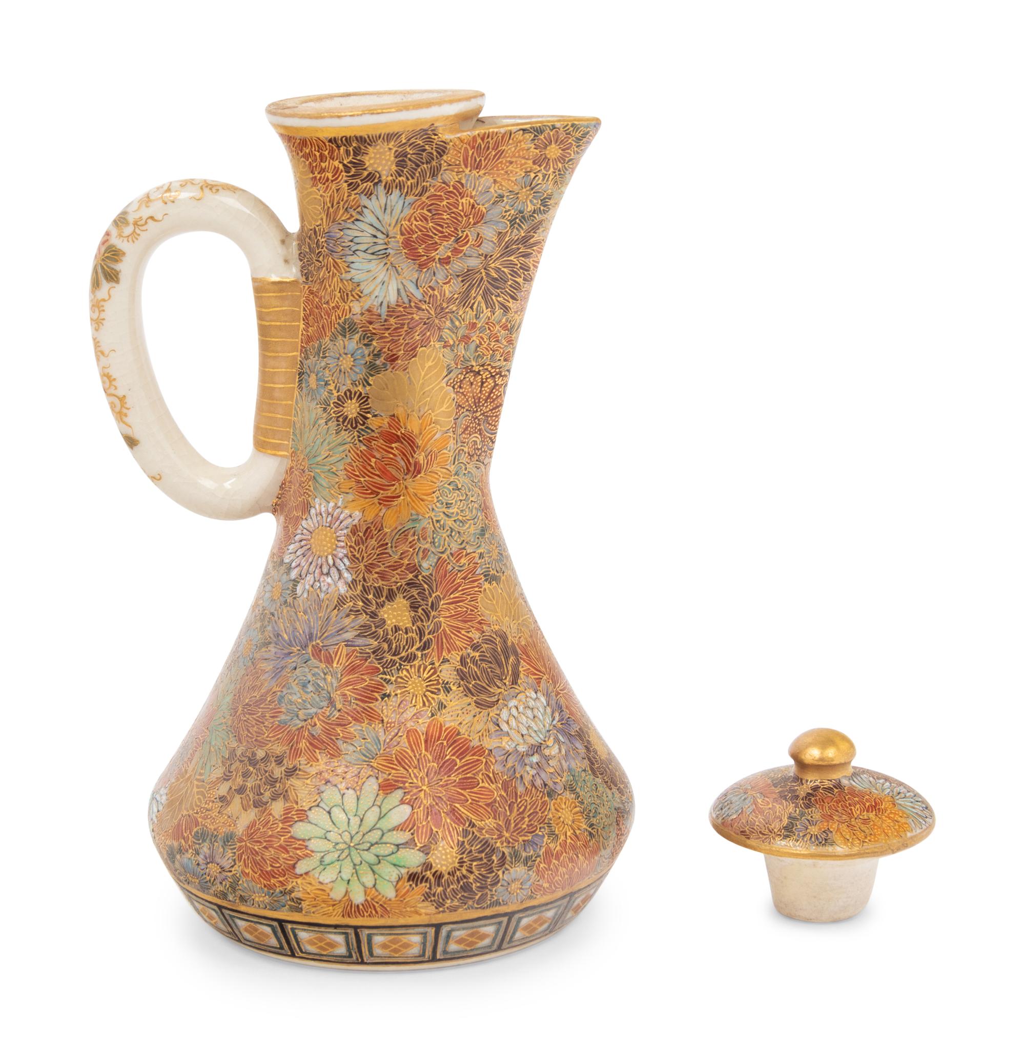 A Small Japanese Satsuma 'Millefleur' Covered Ewer