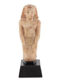 A White Stone Figure of a Kneeling Pharaoh