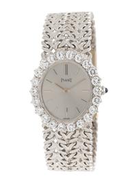 PIAGET, 18K WHITE GOLD AND DIAMOND WRISTWATCH