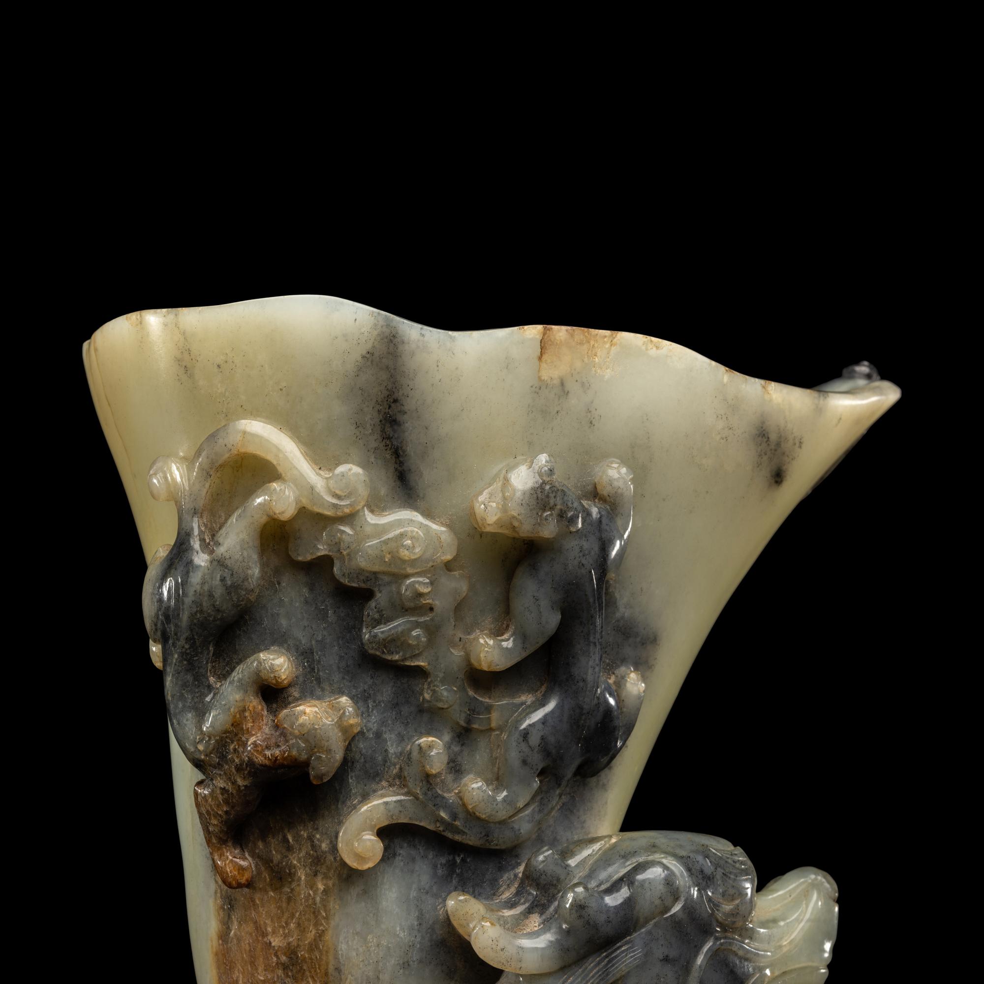 A Chinese Celadon and Grey Jade Libation Cup, Juebei 灰白玉龙纹爵杯