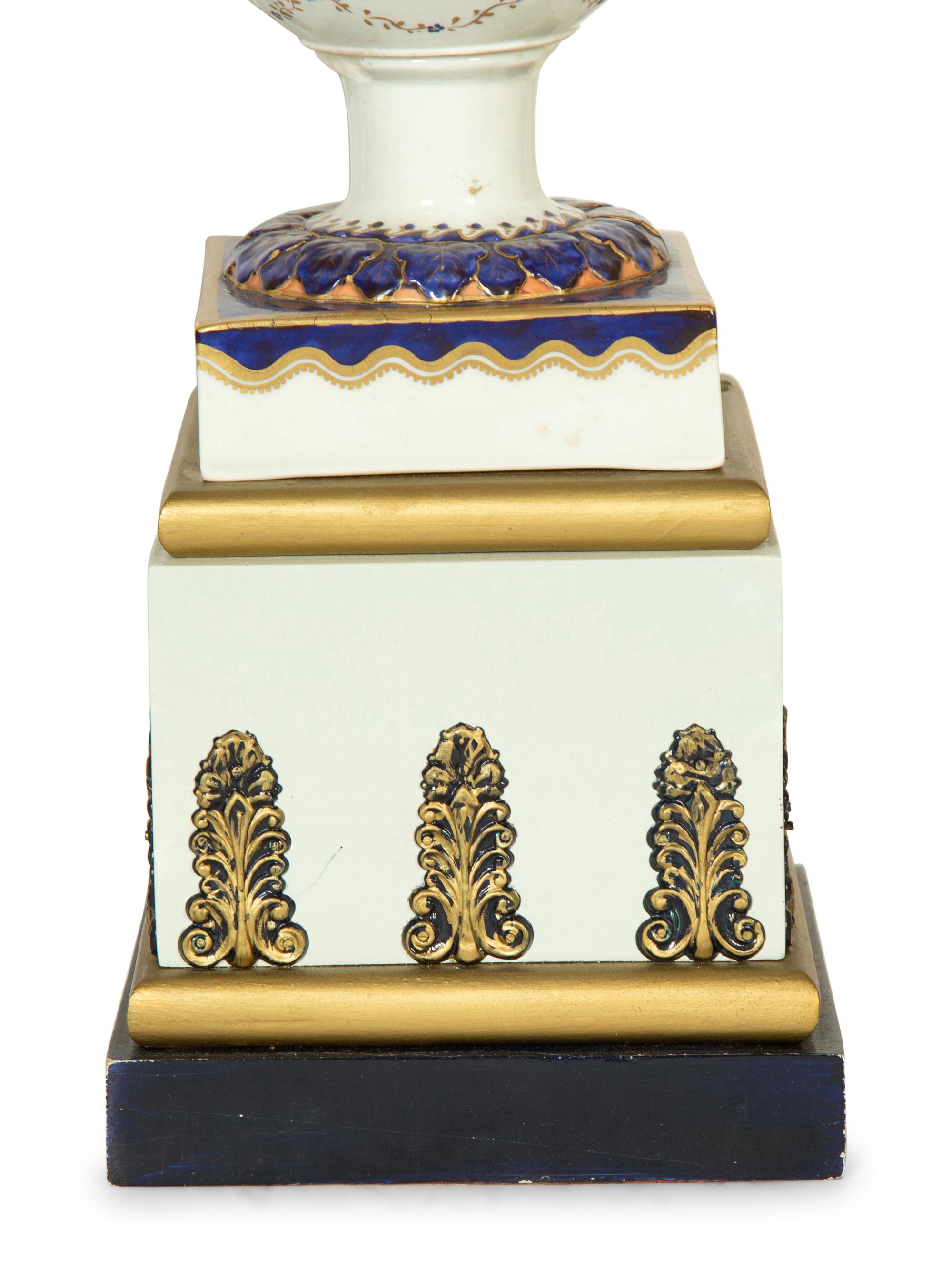 A Pair of Paris Porcelain Lamps and an Additional Lamp