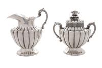 A Mexican Silver Creamer and Sugar Set, Maciel, Mexico City, 20th Century, each of handled, lobed form, the covered sugar with a florif