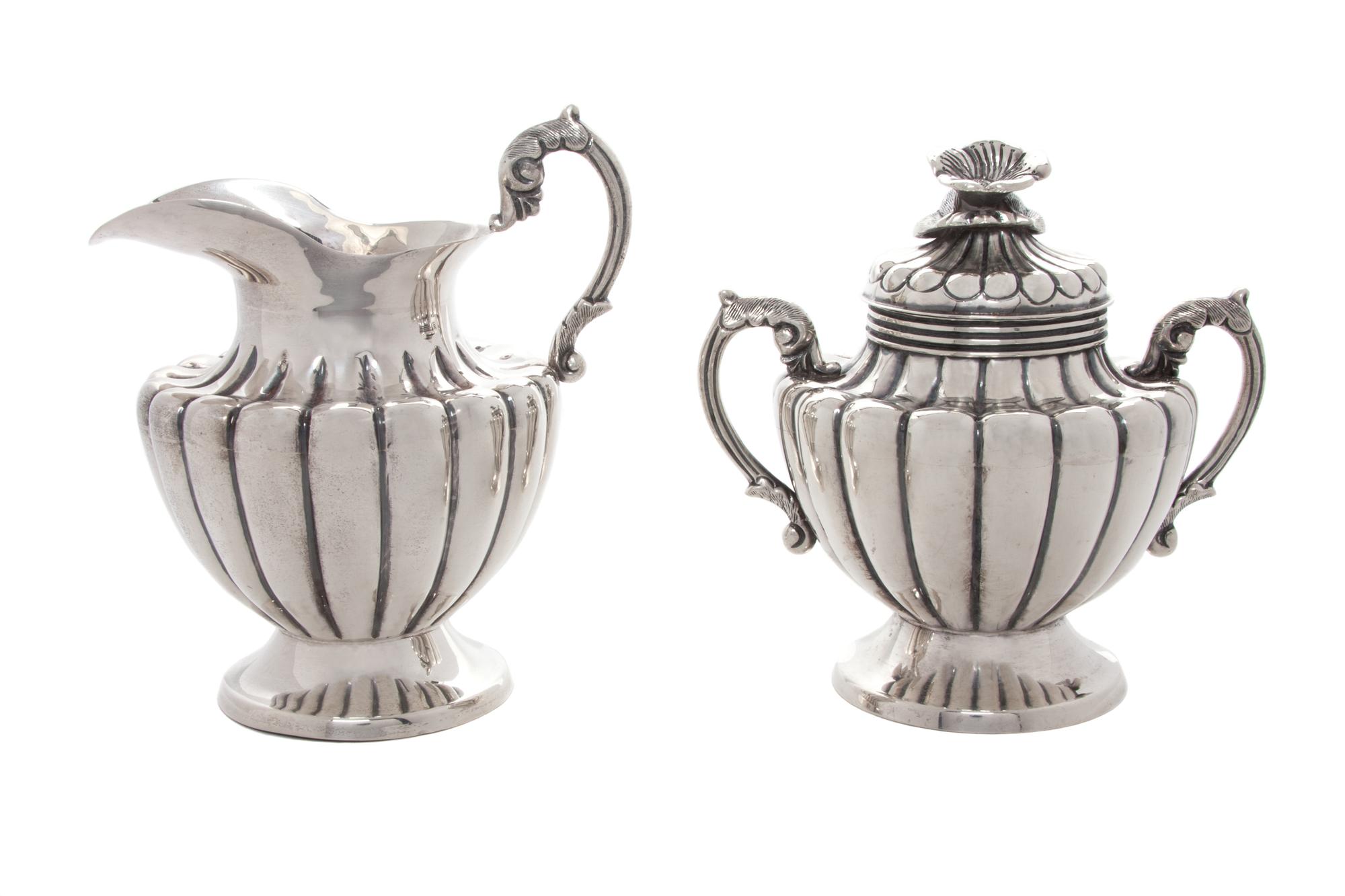 A Mexican Silver Creamer and Sugar Set, Maciel, Mexico City, 20th Century, each of handled, lobed form, the covered sugar with a florif