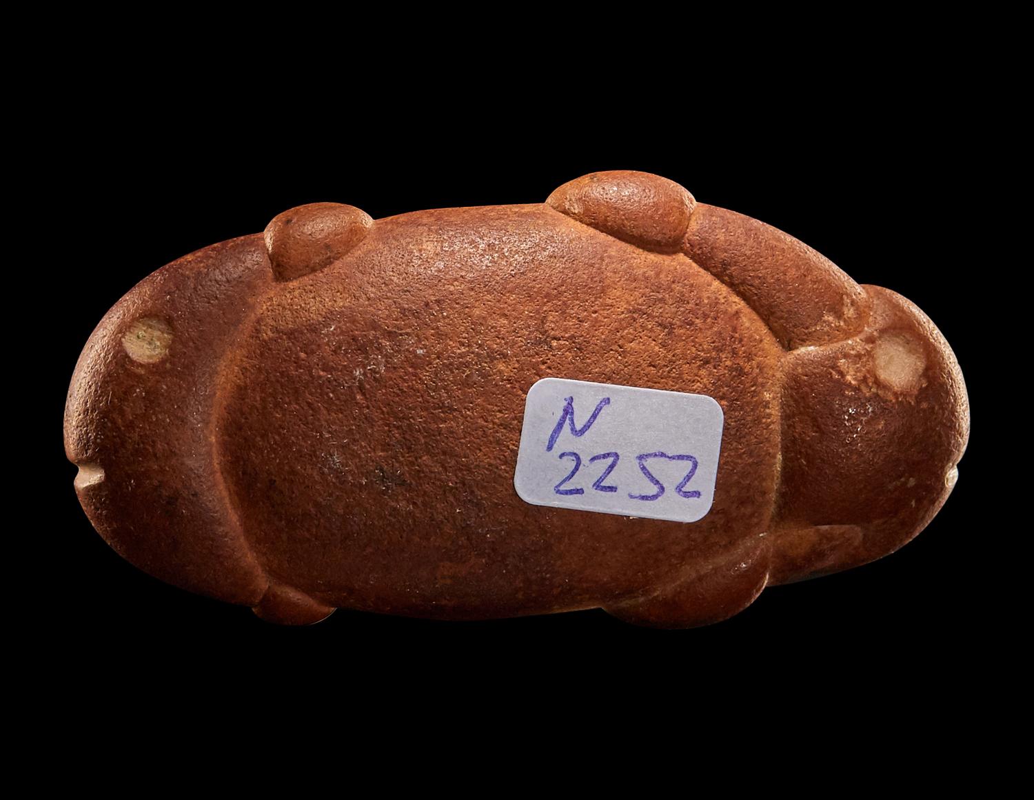 A Near Eastern Marble Double Fish Amulet