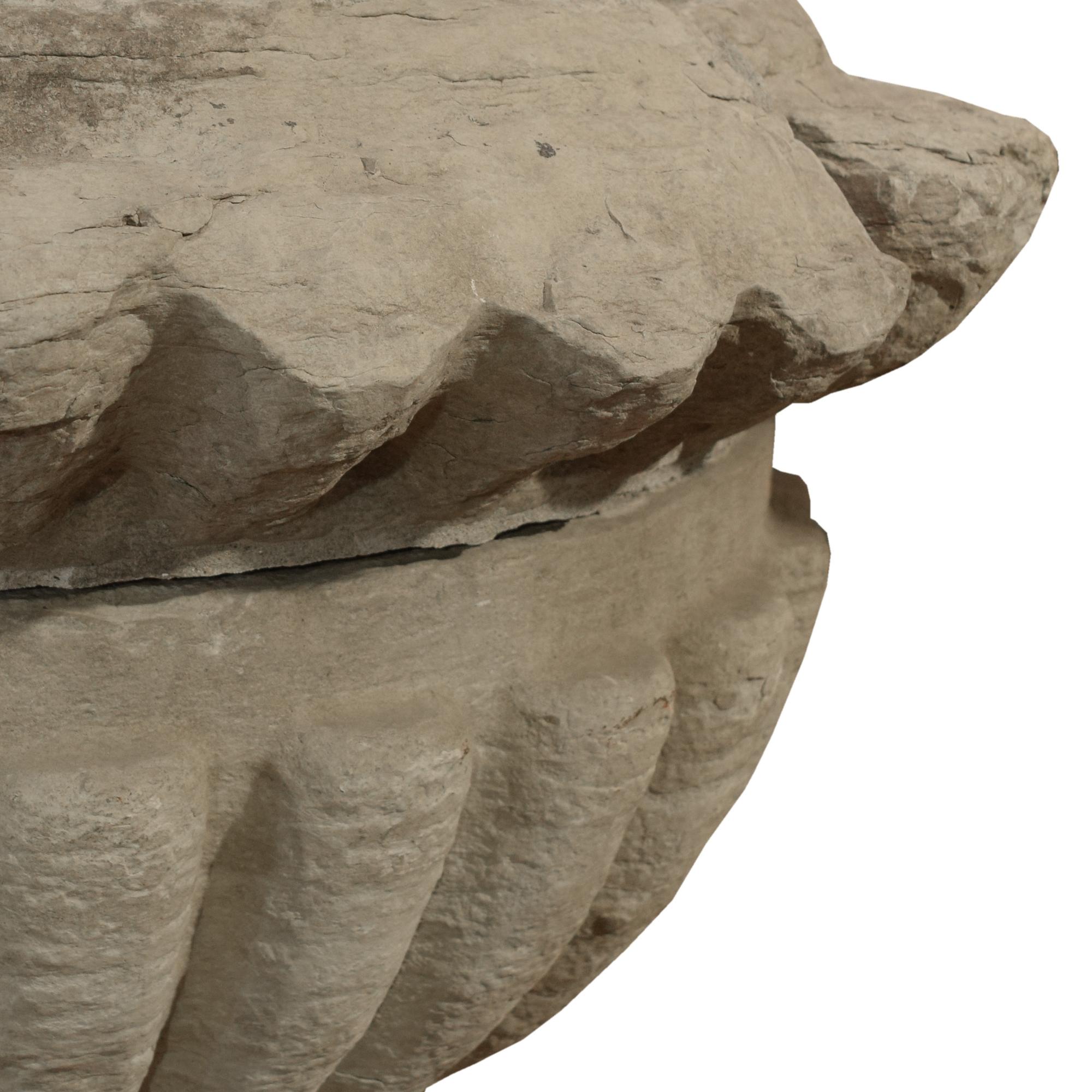 A Carved Limestone Finial from the Second Chicago Courthouse 44" W x 44" D x 53" H — United States, Circa 1935