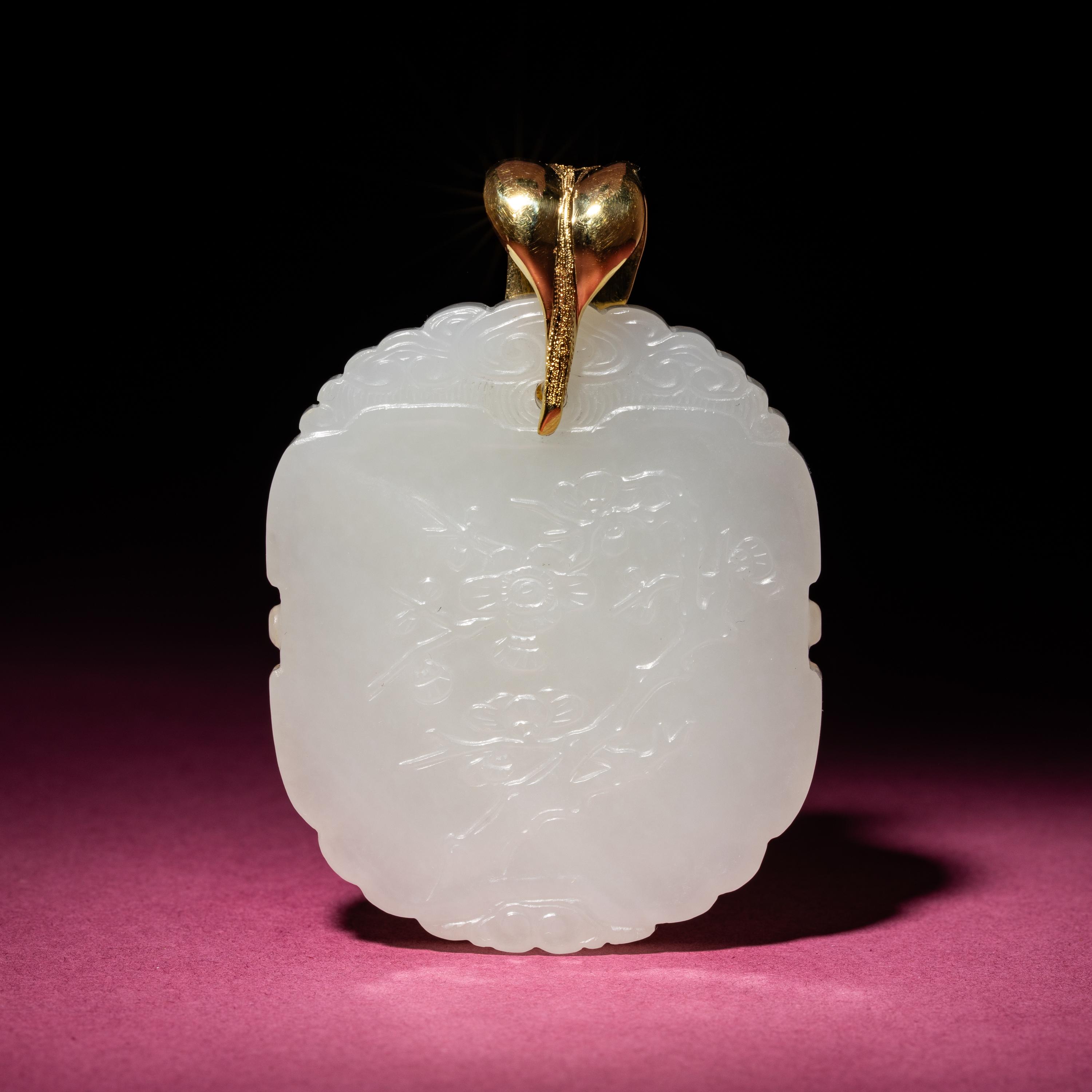 A Chinese White Jade 'Floral' Pendant, 18th/19th Century — 清中期 白玉花卉紋牌