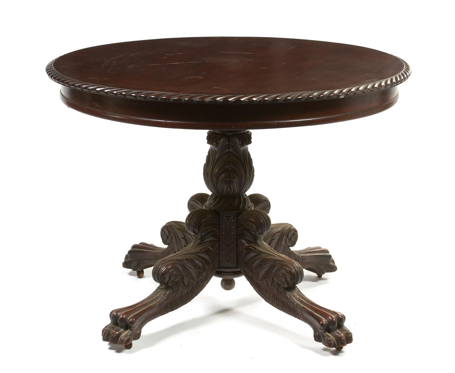 An American Classical Mahogany Center Table, Height 29 1/4 x diameter 40 inches.