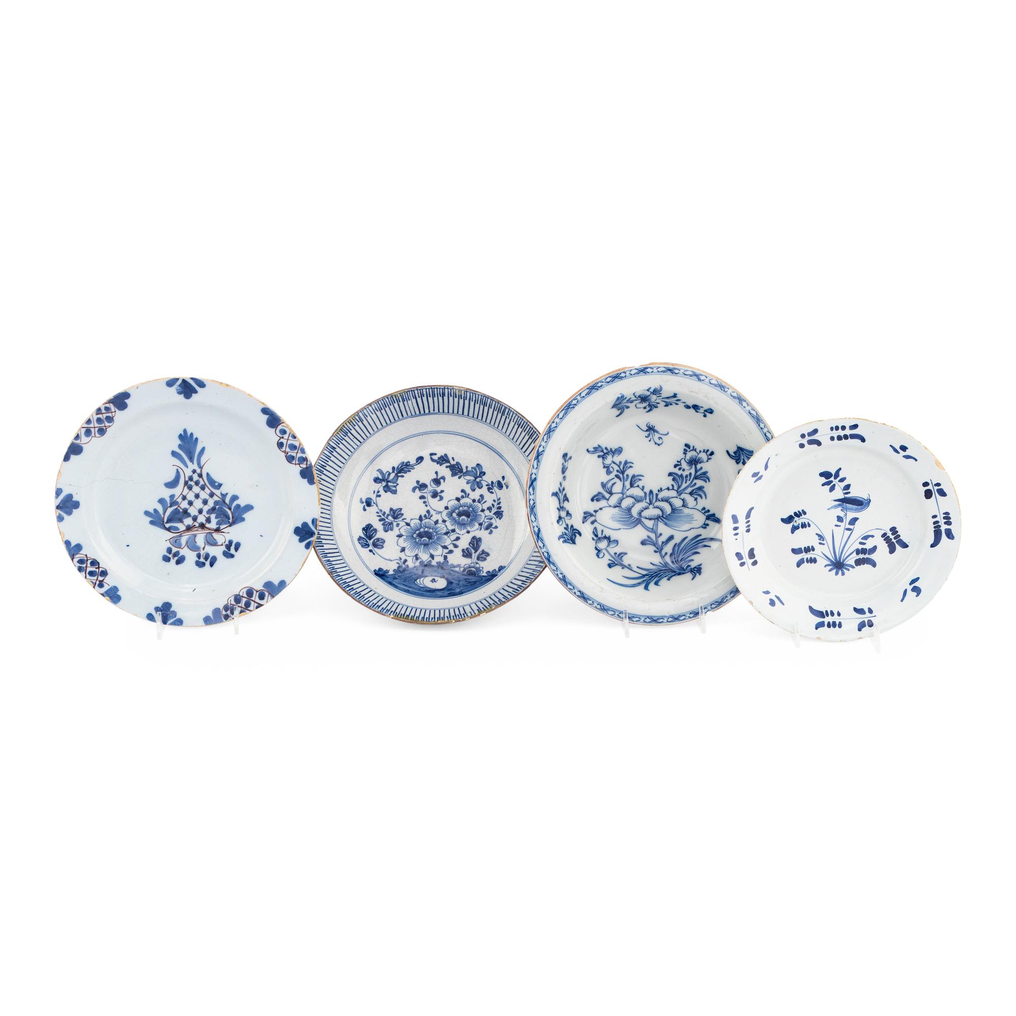 A Collection of Four Delft Blue and White Decorated Articles