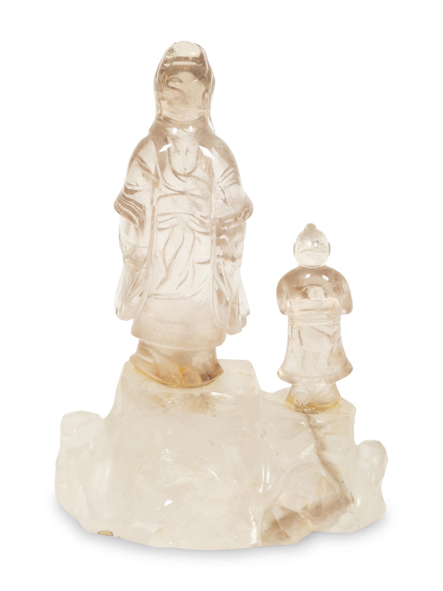 A Chinese Carved Rock Crystal Figure of Guanyin and Attendant