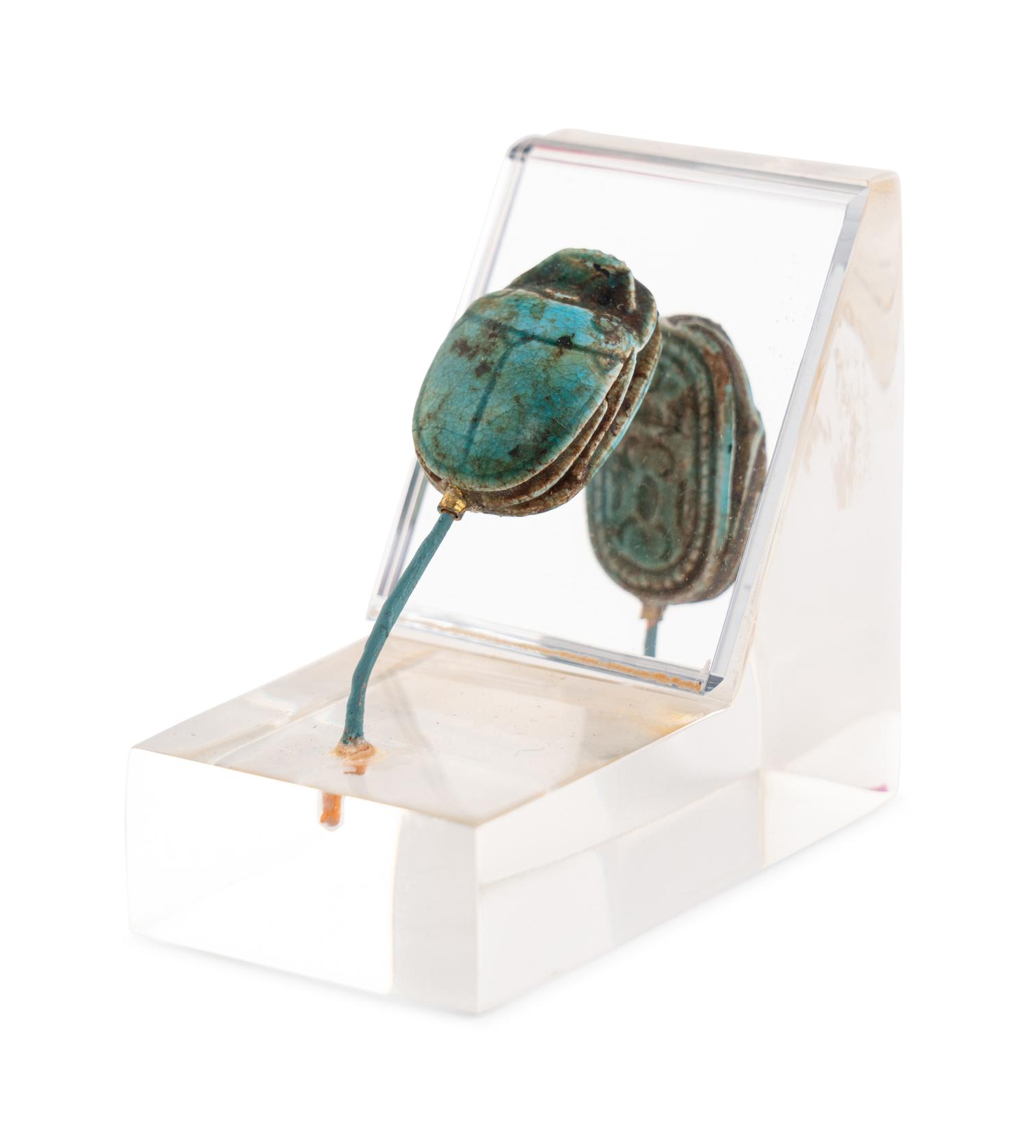 An Egyptian Faience Swivel Scarab
