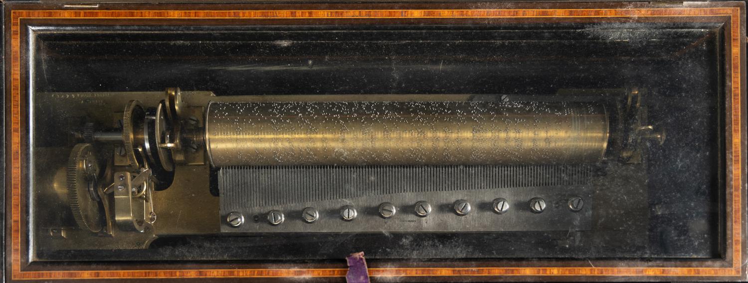 An Interchangeable Music Box on Table by Nicole Frères