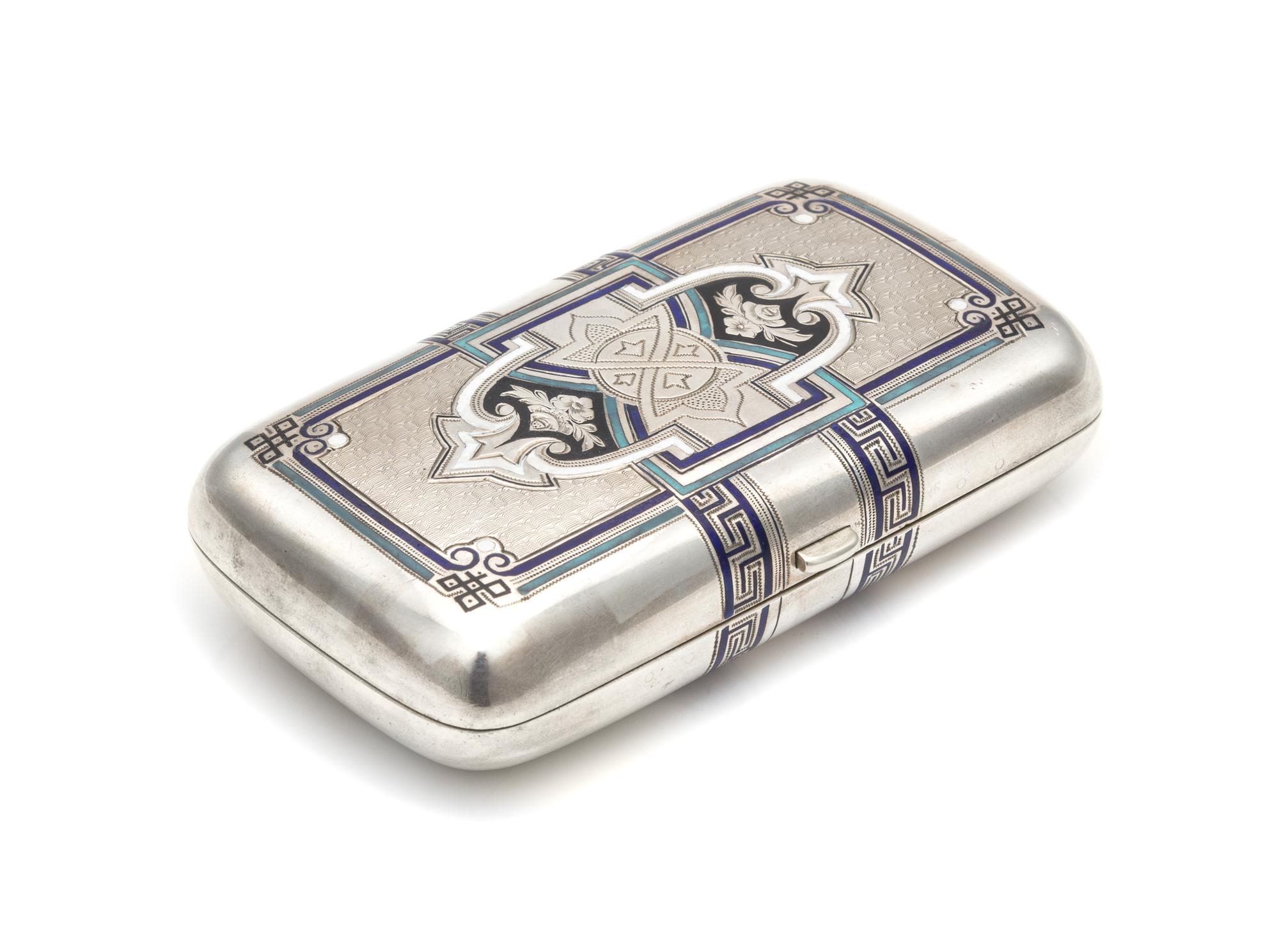 A Russian Silver and Enameled Cigarette Case, Alexei Baranov, Moscow, Early 20th Century, the case with floral decoration on an engine