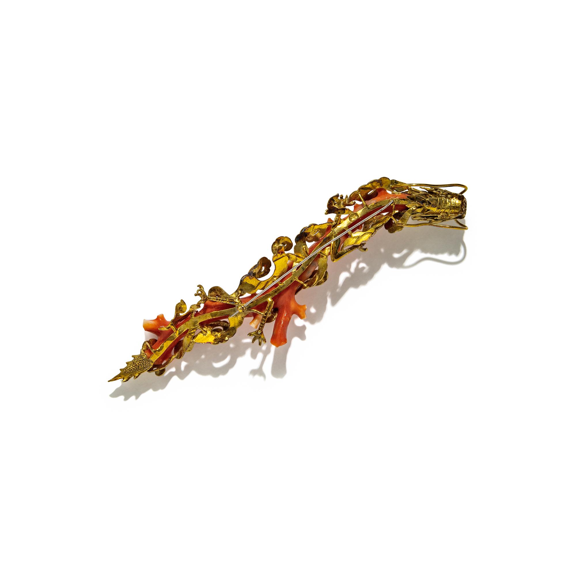 CORAL BRANCH AND YELLOW GOLD DRAGON BROOCH