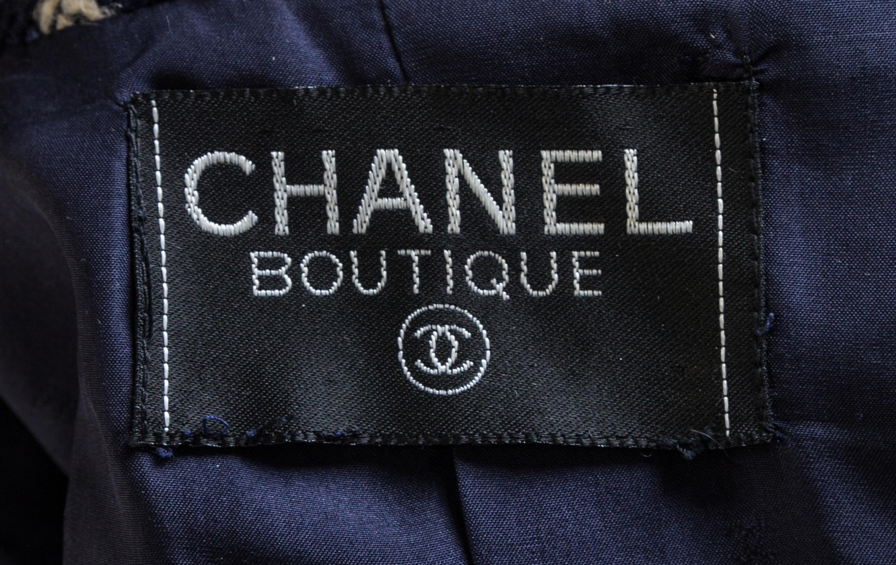 A Chanel Navy and White Boucle Skirt Ensemble, Skirt size 38.