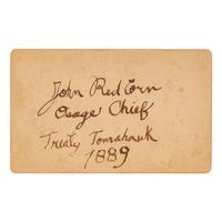 [NATIVE AMERICANS]. CDV of Native American identified as Osage Chief John Red Corn with treaty tomahawk. N.p.: n.p., 1889.