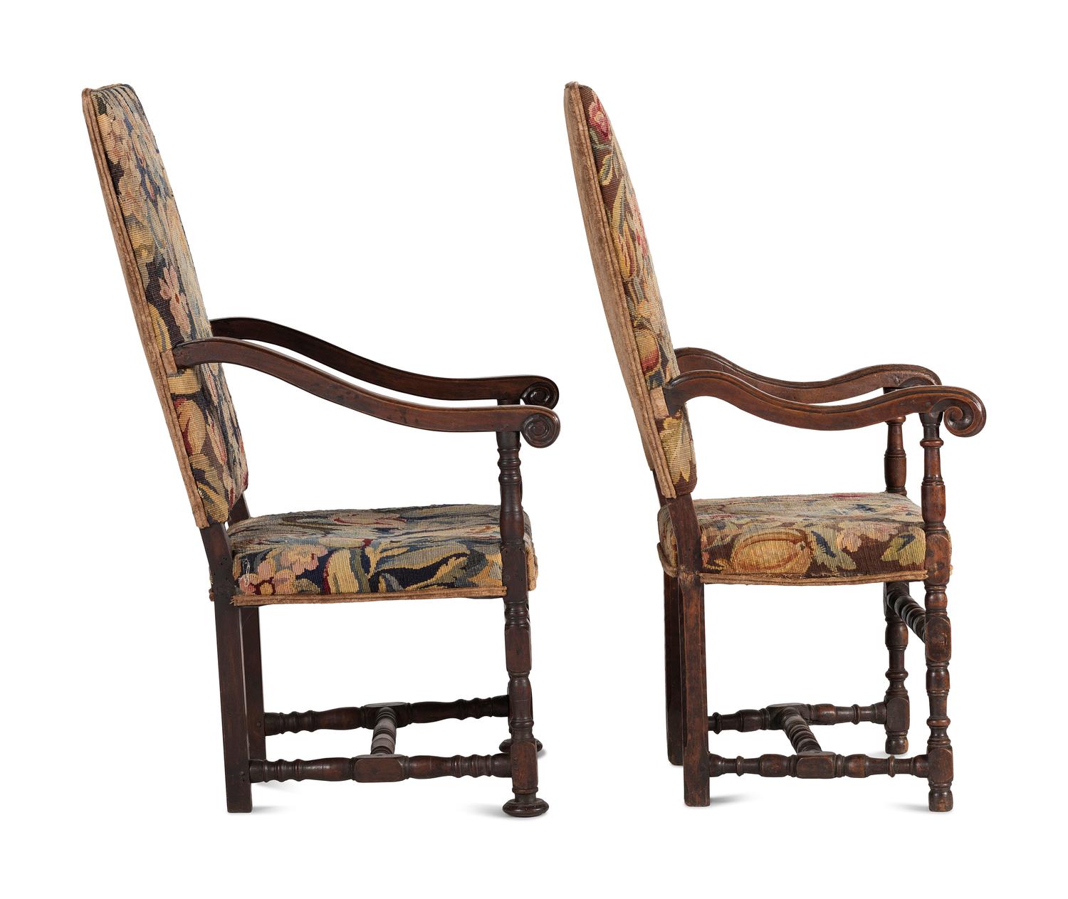 A Matched Pair of French Scroll-Carved and Turned Walnut Tapestry Upholstered Fauteuils