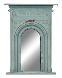 A Patinated Cast Iron Mirror