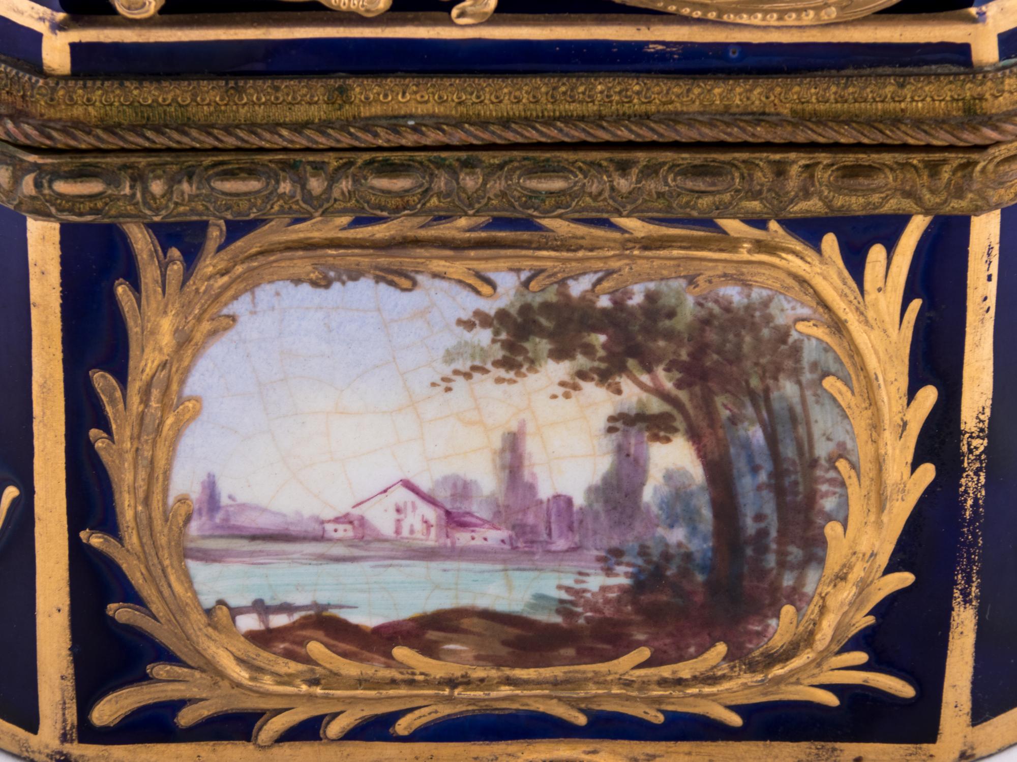A Sèvres Style Gilt Metal Mounted, Painted and Parcel Gilt Porcelain Table Casket