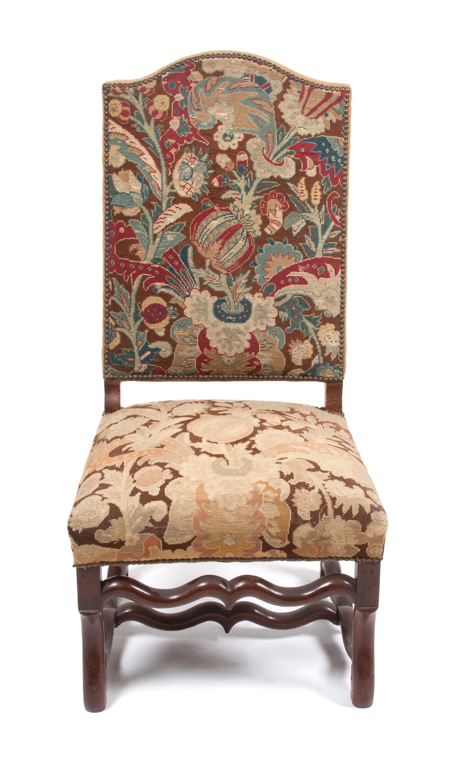 A French Provincial Tapestry Upholstered Walnut Fauteuil Height 42 1/2 inches.