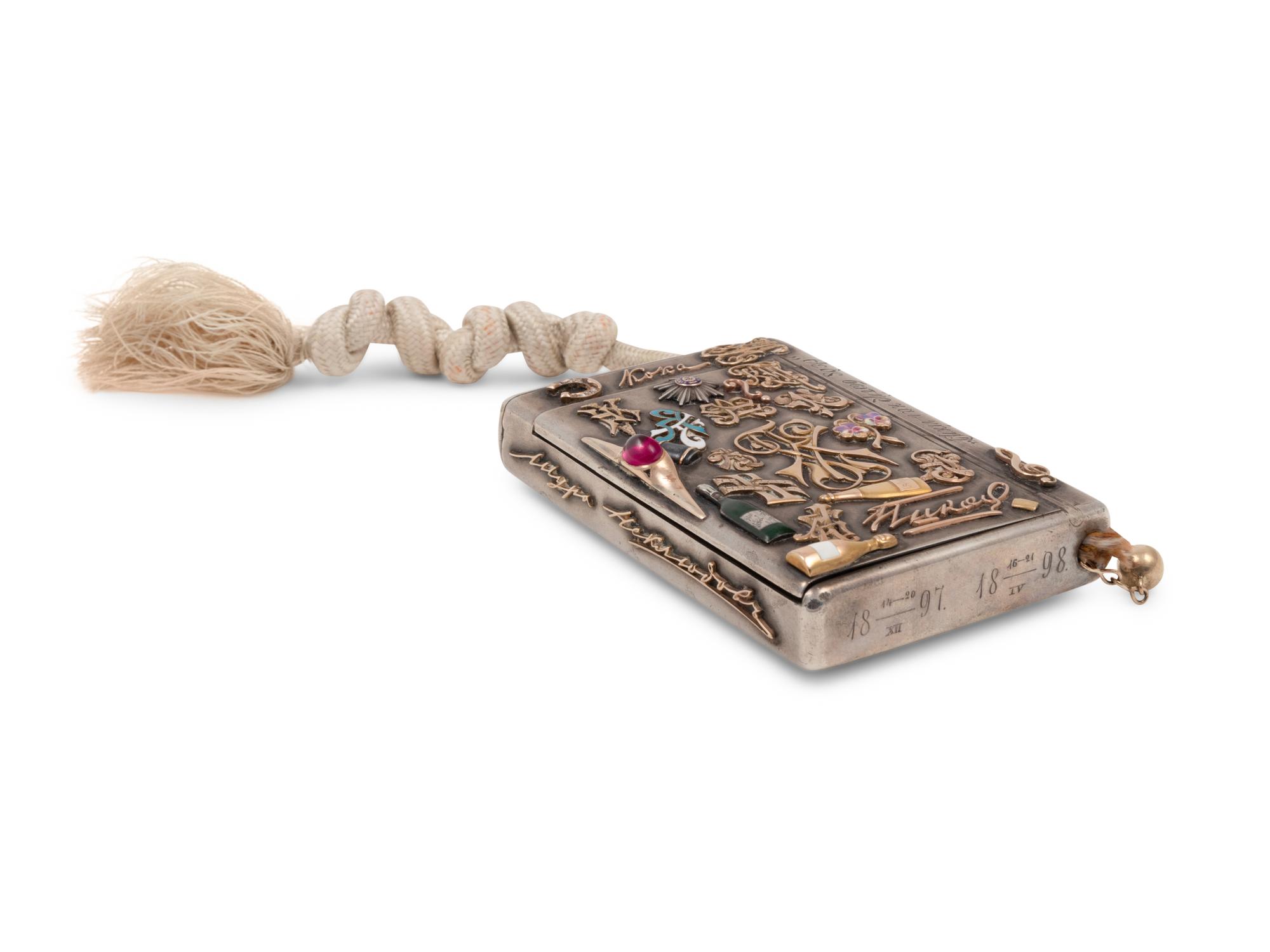 A Russian Silver and Applied Gold and Enamel Charm Decorated Cigarette Case