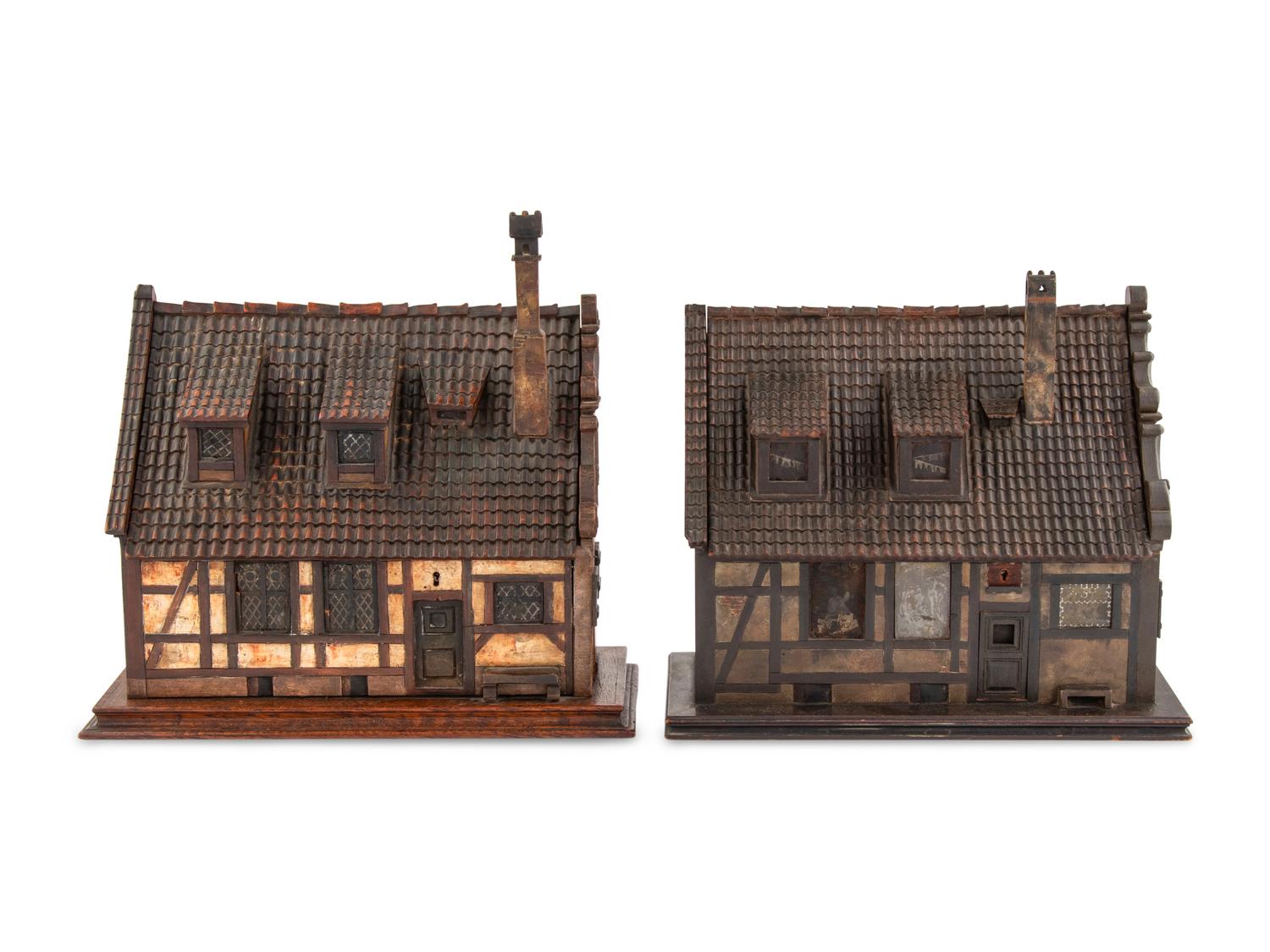 A Pair of German Carved and Painted Timber House-Form Boxes