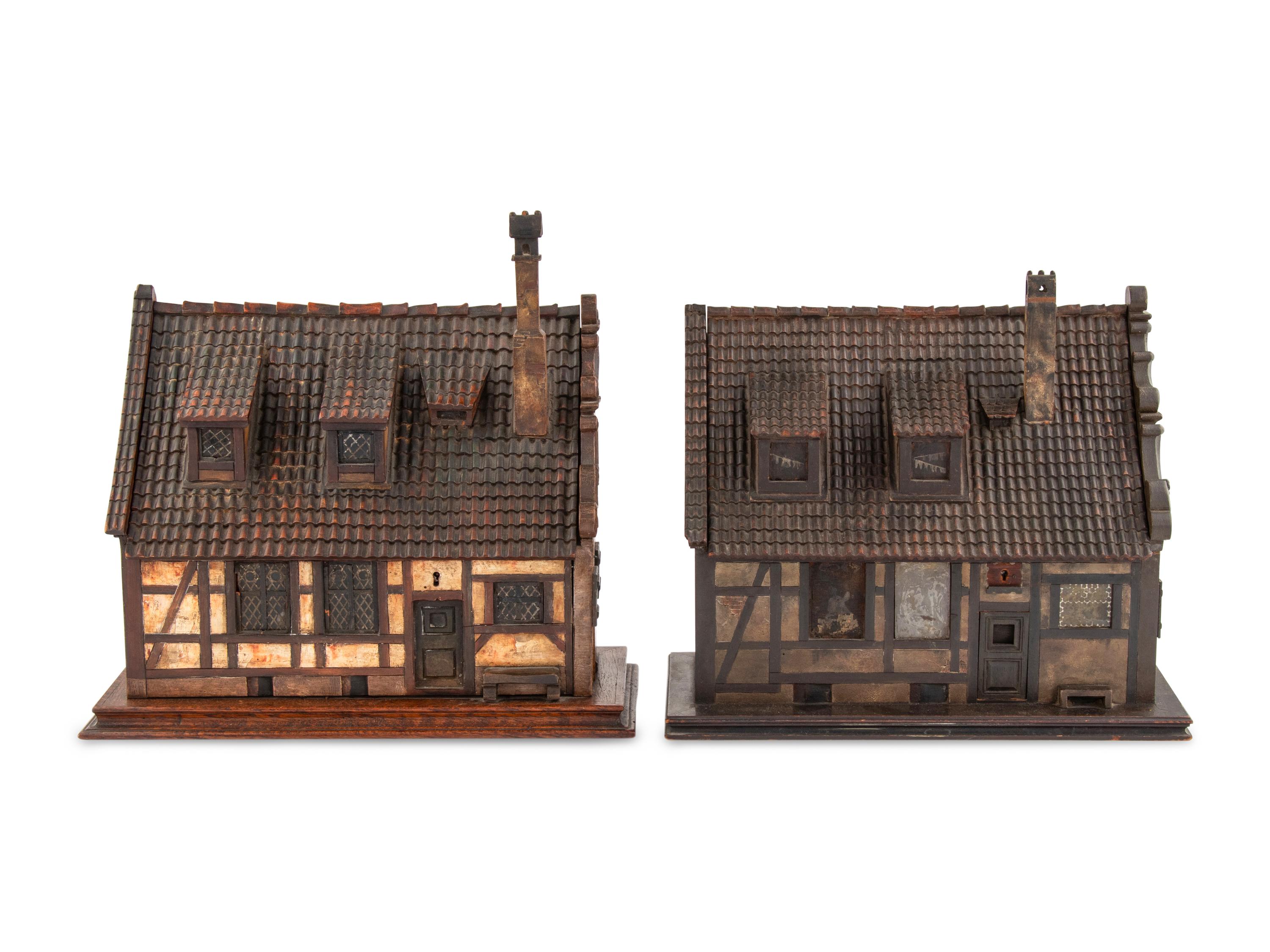 A Pair of German Carved and Painted Timber House-Form Boxes