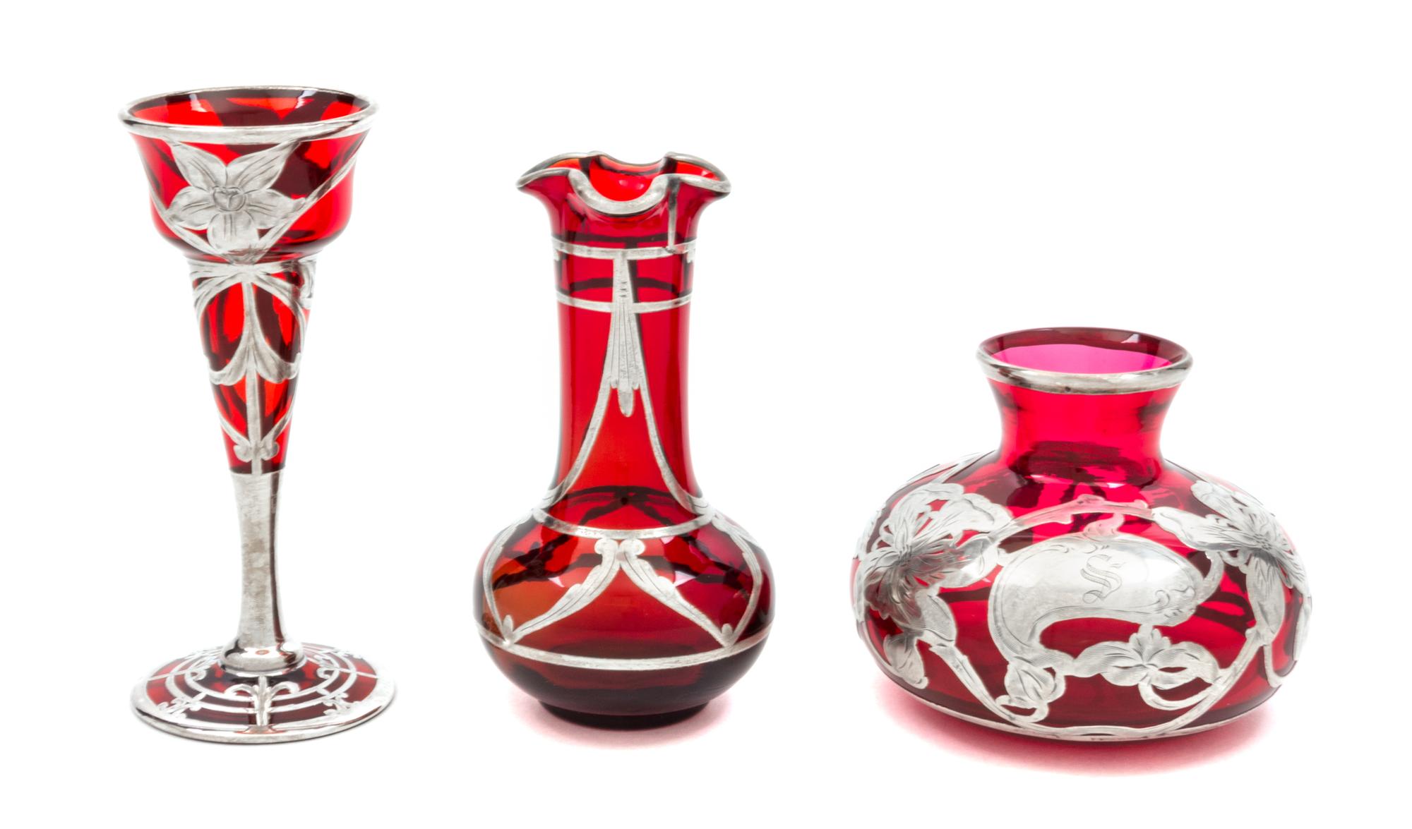 A Group of Three Silver Overlay Glass Articles Height of cordial glass 5 inches.