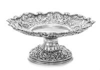 An American Silver Compote, Tiffany & Co., New York, NY, having a rocaille and S-scroll decorated rim, raised on a circular base.
