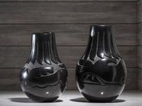 Pair of Carved Blackware Pottery Vases