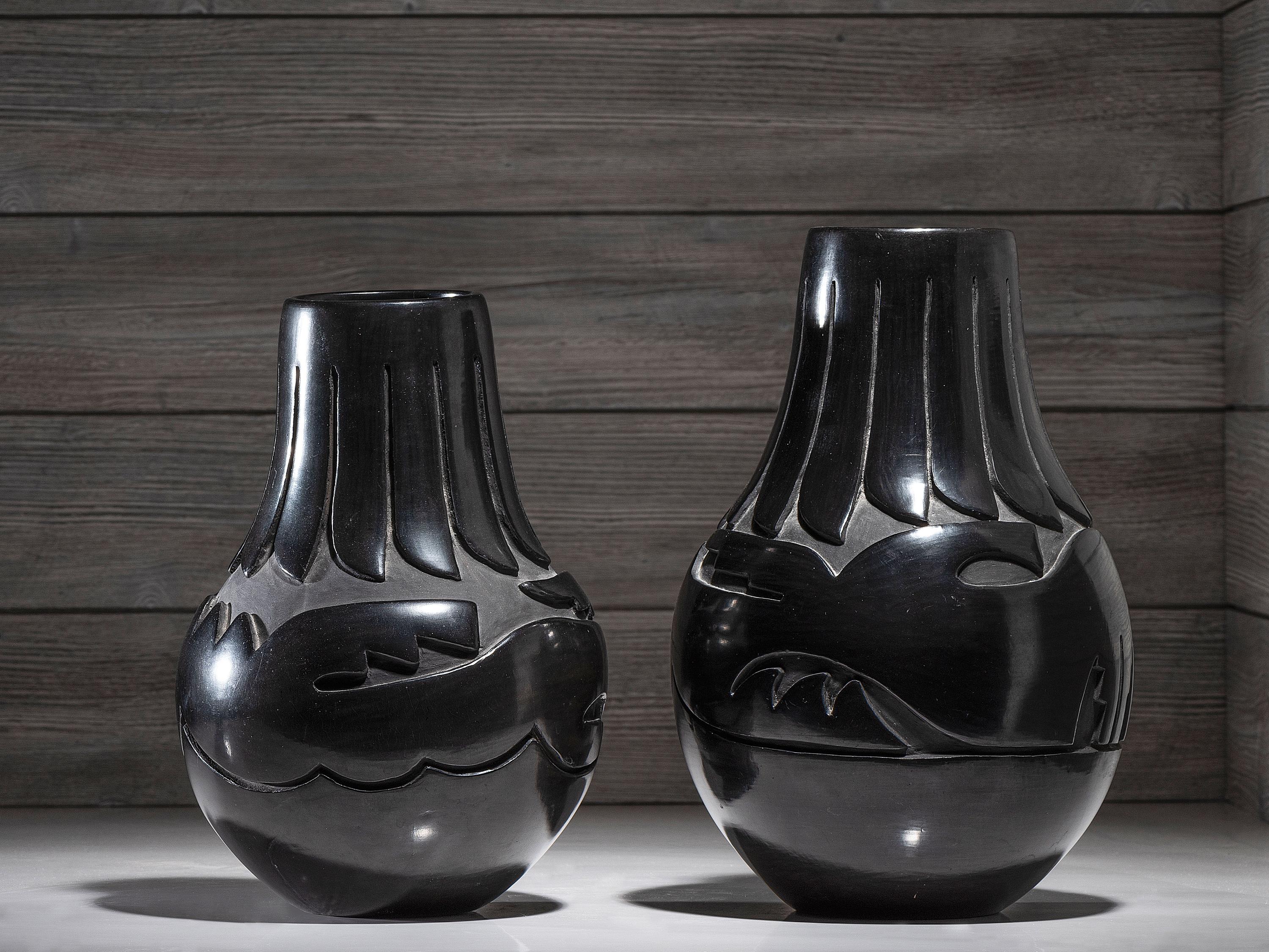 Pair of Carved Blackware Pottery Vases