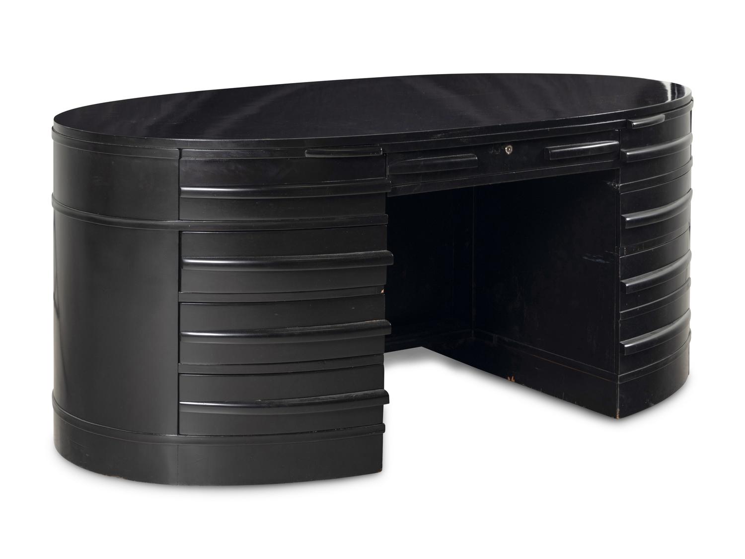 An Ebonized Oval Desk