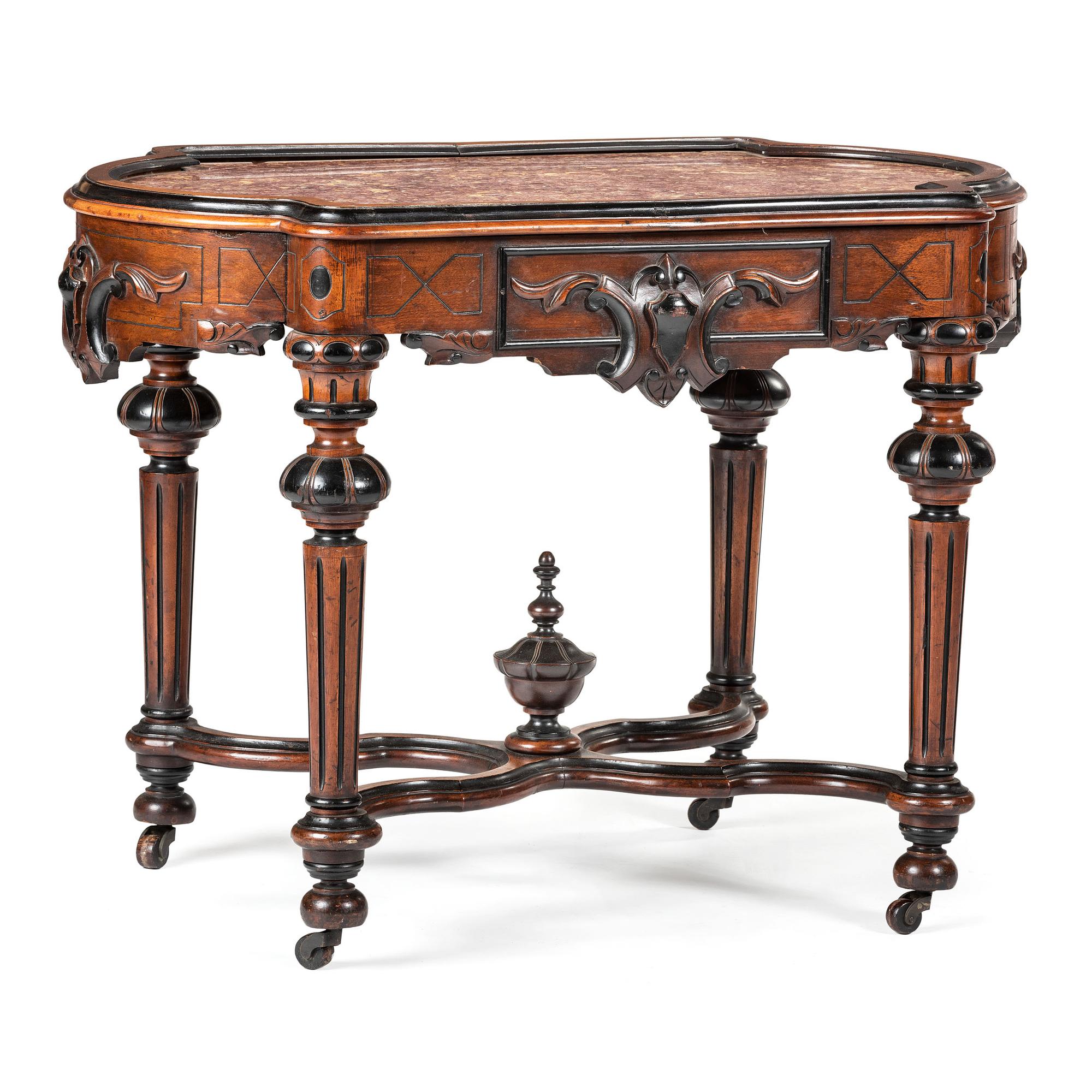A Victorian Carved Walnut Marble-Top Table