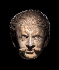 A Gandharan Stucco Head of a Solider