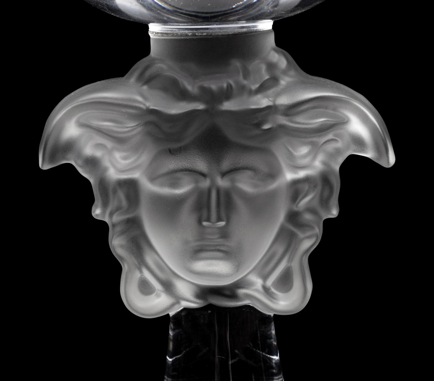 A Group of Versace Medusa Lumiere Glass Articles