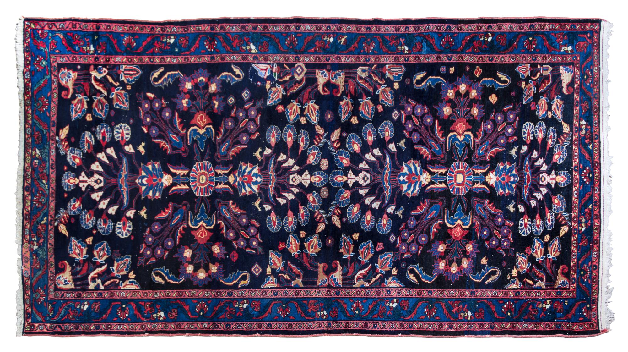A Persian Wool Rug 11 feet 7 inches x 6 feet 5 inches.