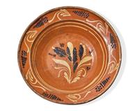 A Glazed and Slip-Decorated Earthenware Pan, North Carolina, 19th century