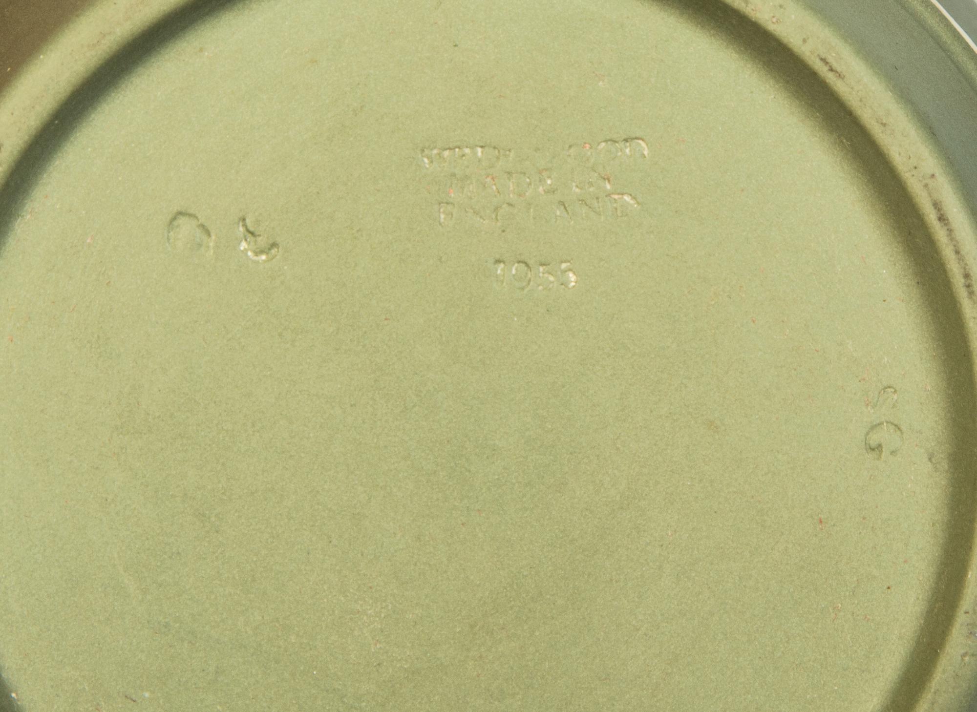 Seven Jasperware Pitchers and Table Articles