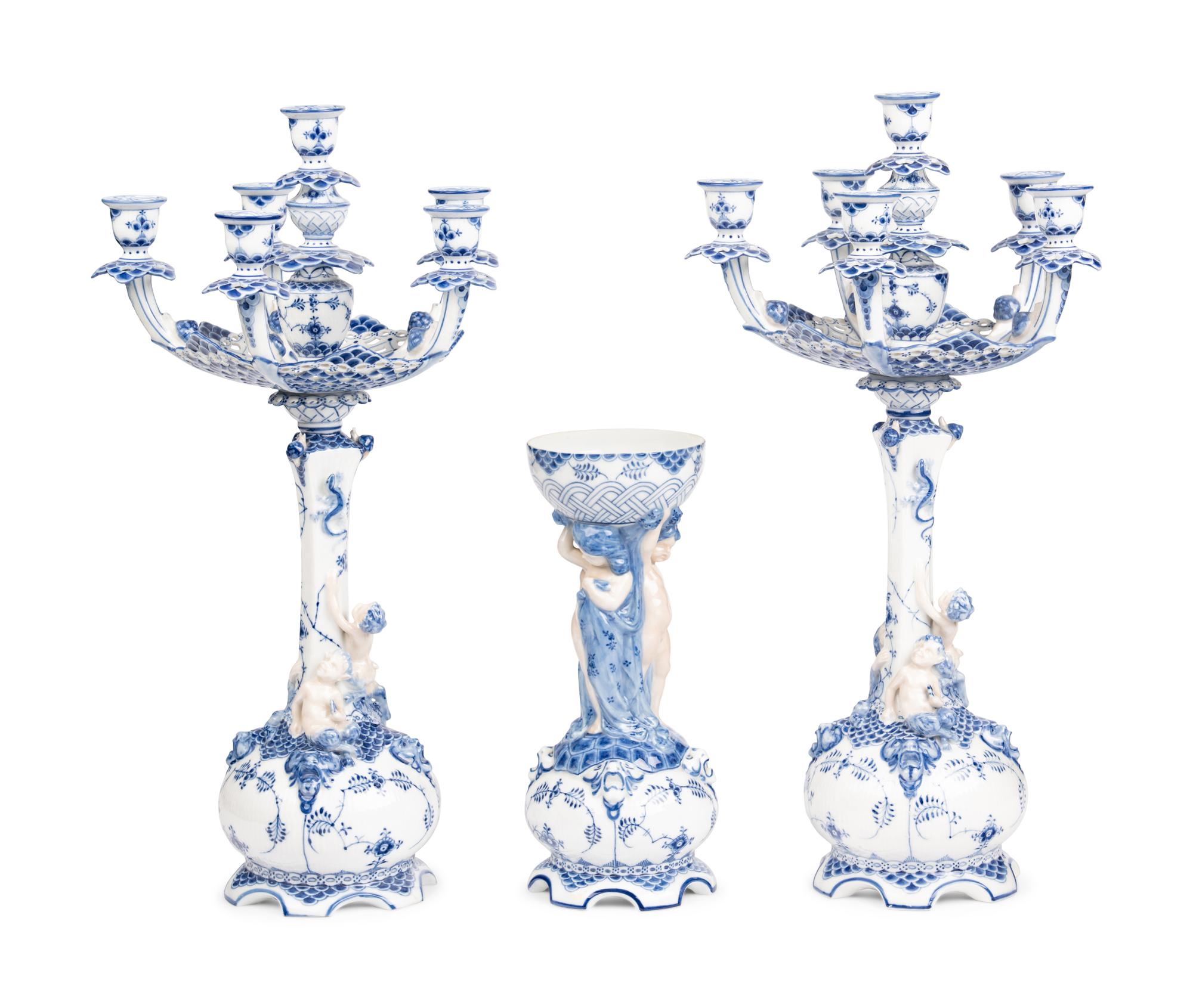 An Assembled Royal Copenhagen Blue Fluted Full Lace Porcelain Table Garniture