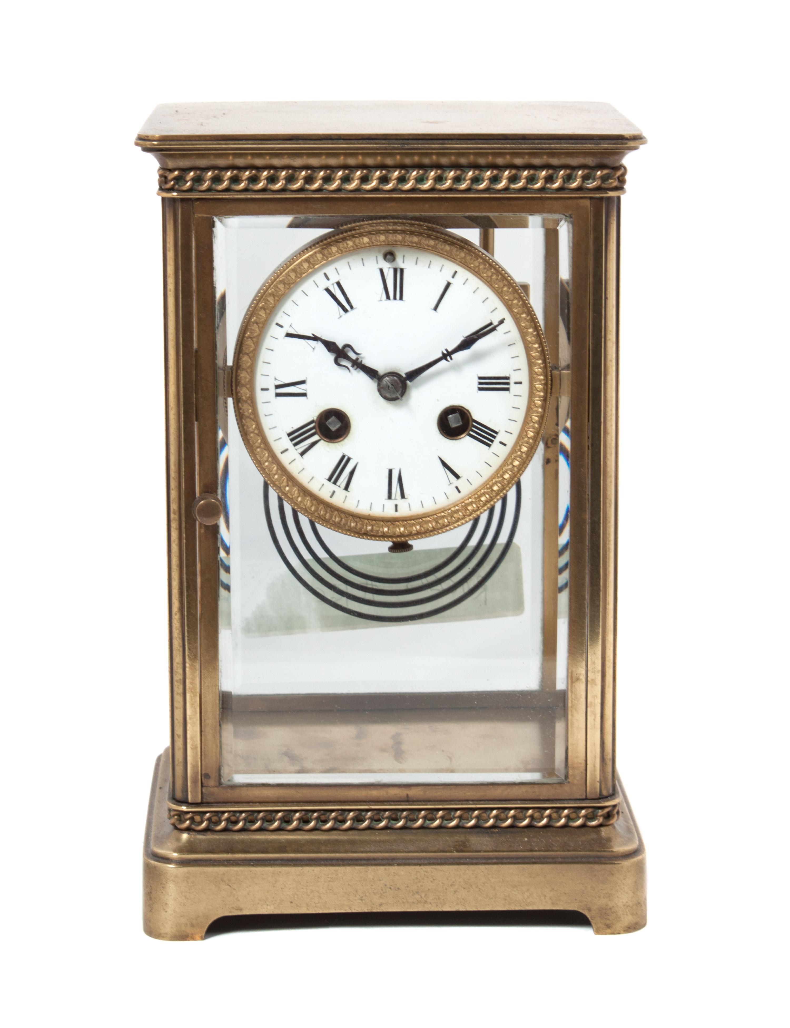 A French Gilt Bronze Regulator Clock Height 9 inches.