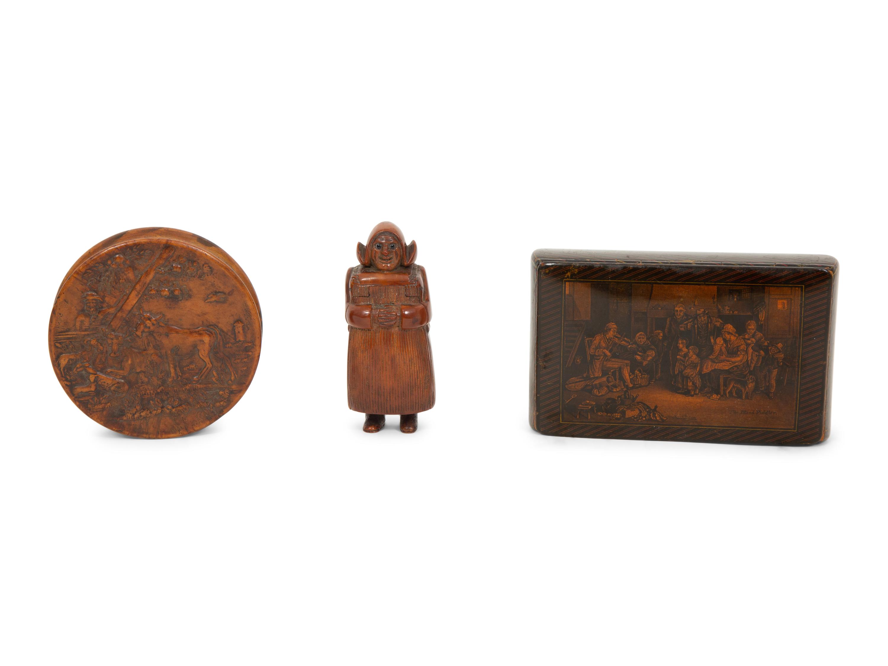 A Scottish Mauchline Ware Table Snuff Box, a French Pressed Wood Box and a Carved Dutch Girl Figural Snuff Box