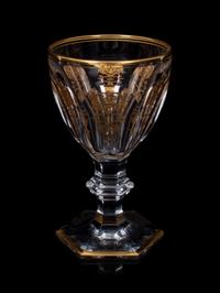 A Baccarat Empire Gilt Decorated Stemware Service