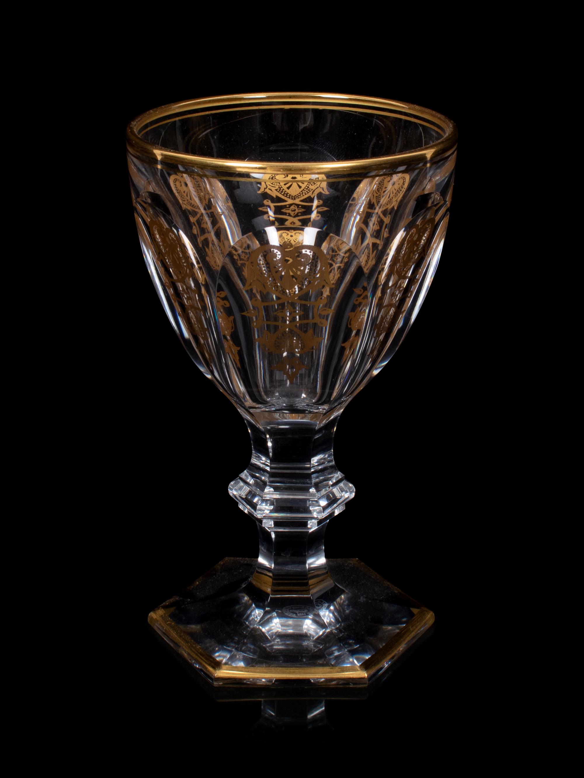 A Baccarat Empire Gilt Decorated Stemware Service