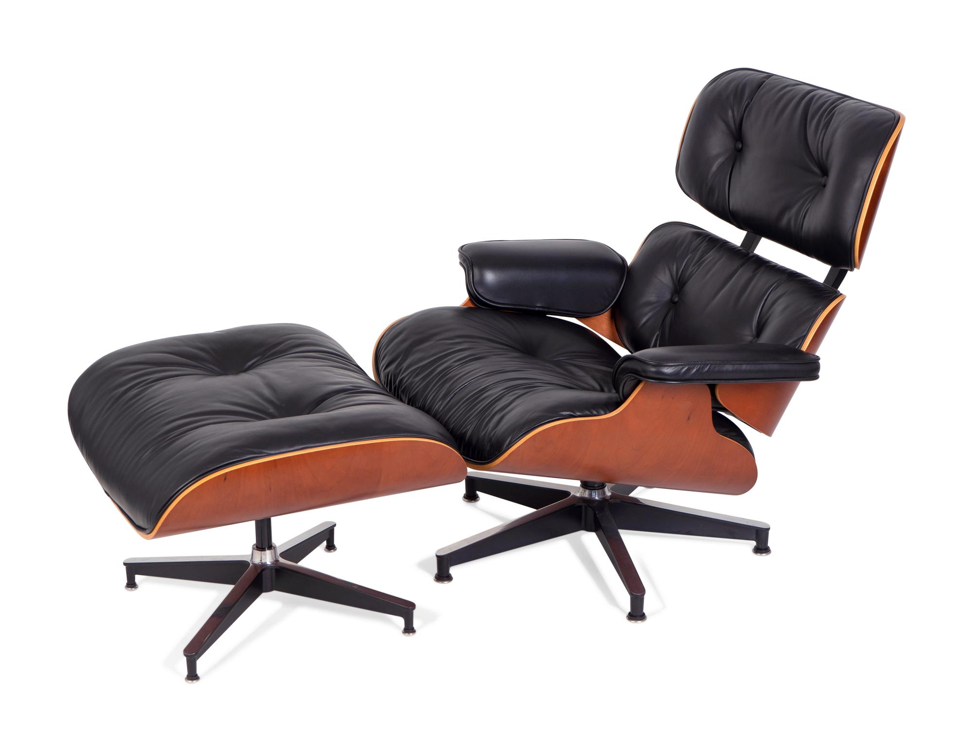 An Eames Laminated Walnut and Black Leather Lounge and Ottoman — FOR HERMAN MILLER
