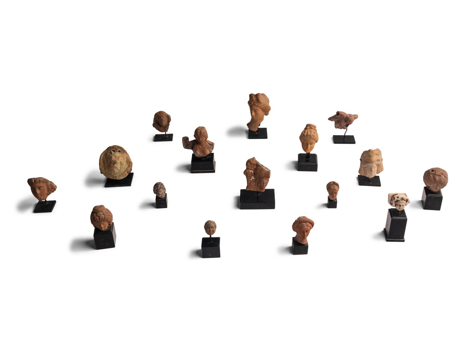 Sixteen Greco-Roman Terracotta Heads and Figures