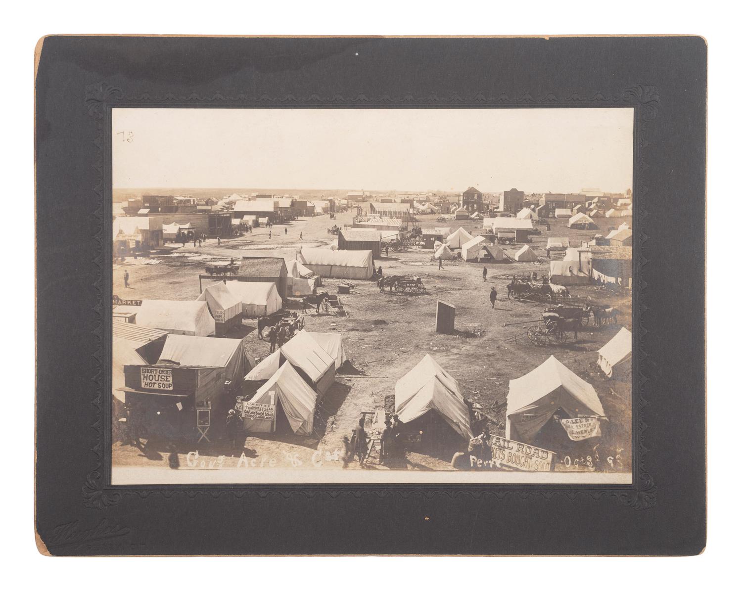 [WESTERN AMERICANA]. A group of 4 Oklahoma Land Rush photographs. Perry, Oklahoma Territory: Hughes, 28 September-3 October 1893.