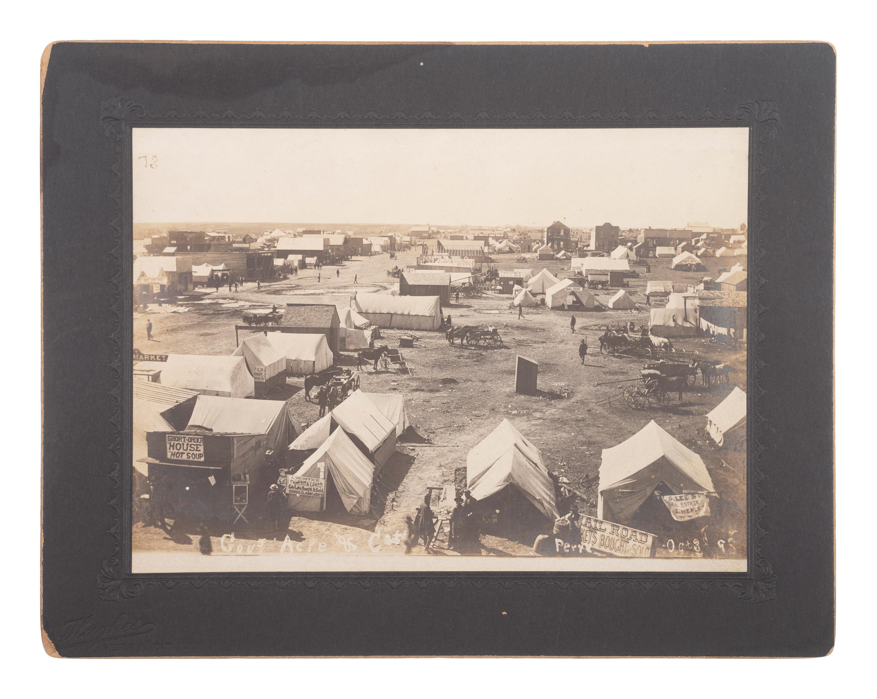[WESTERN AMERICANA]. A group of 4 Oklahoma Land Rush photographs. Perry, Oklahoma Territory: Hughes, 28 September-3 October 1893.