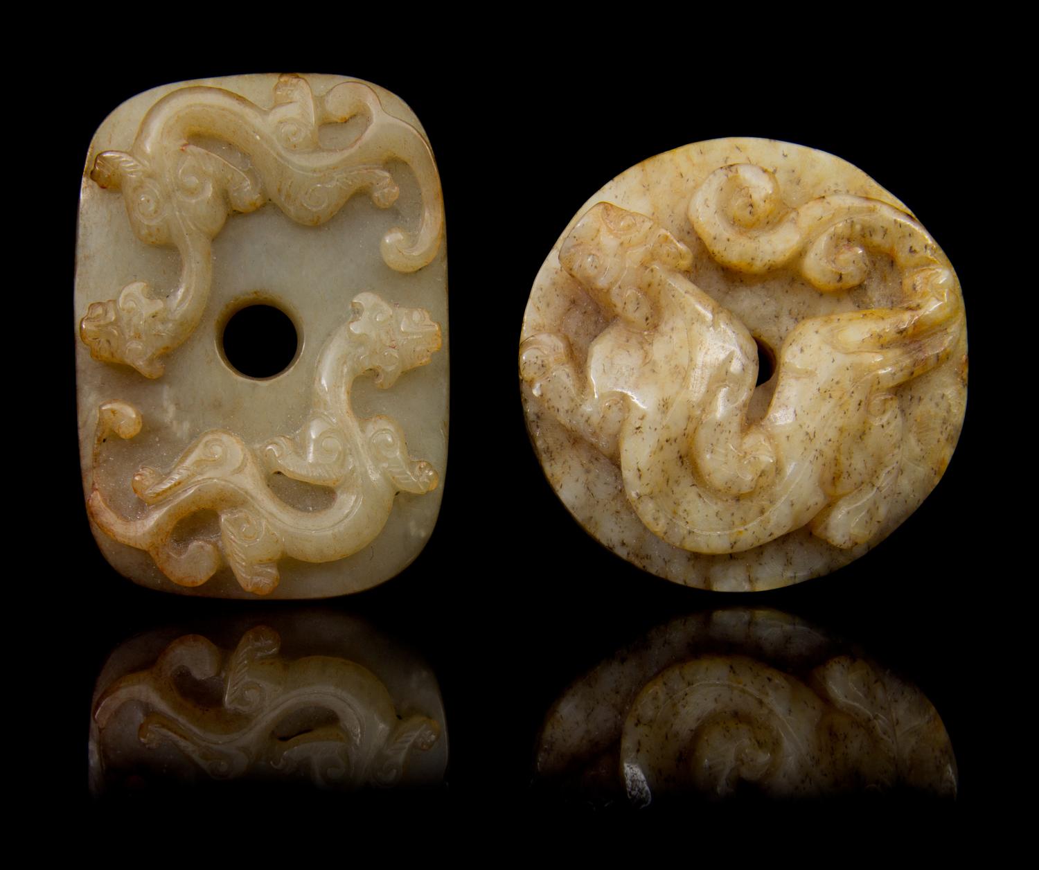 Two Carved Jade Pendants Diameter of first 2 1/8 inches.