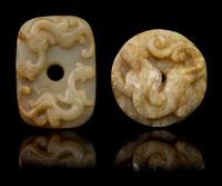Two Carved Jade Pendants Diameter of first 2 1/8 inches.