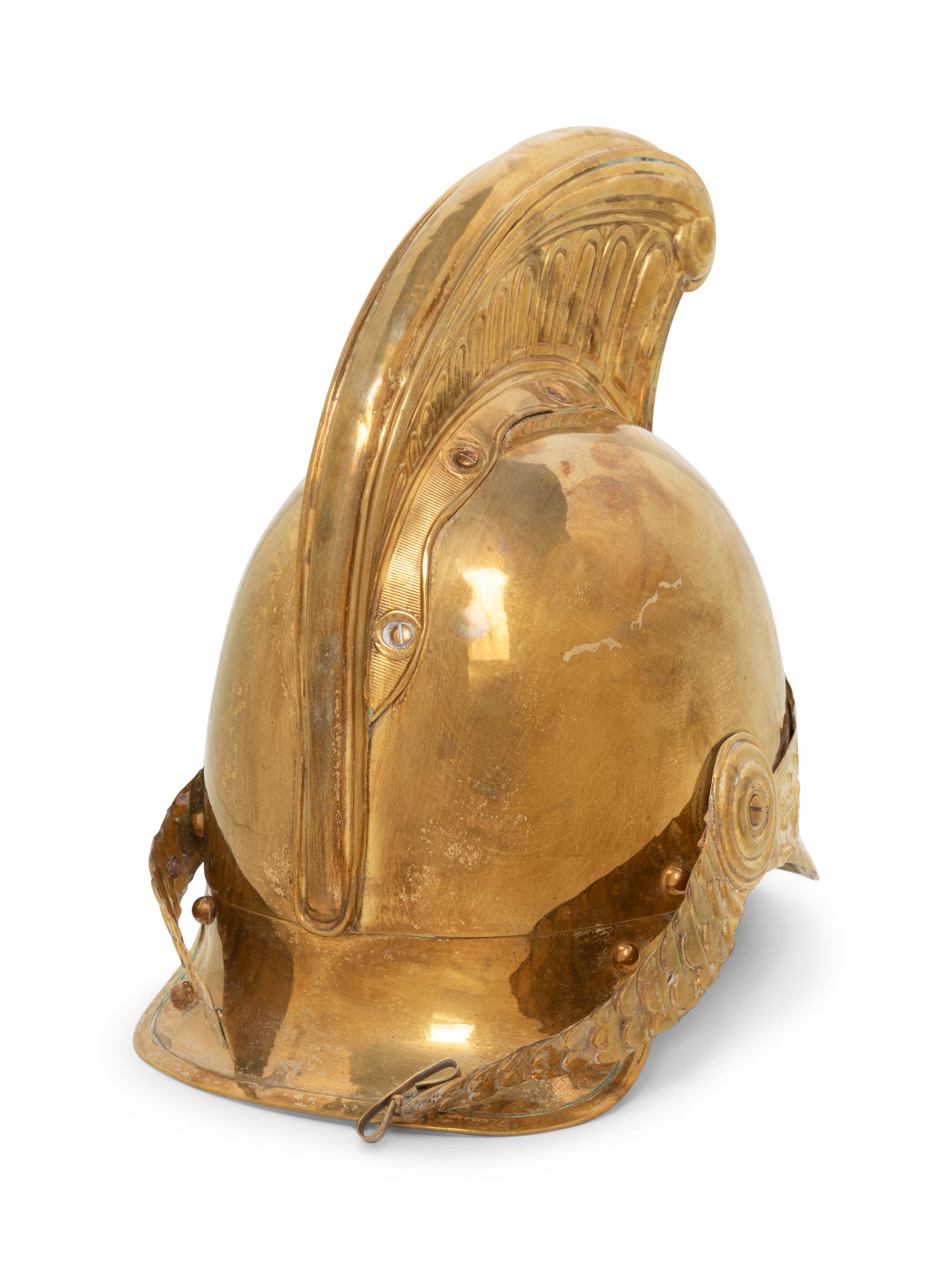 A Continental Brass Parade Helmet