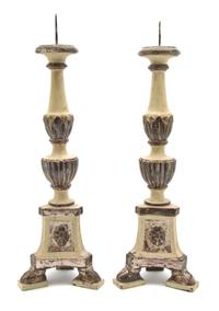 A Pair of Italian Carved, Painted and Silvered Wood Pricket Sticks, Height overall 23 1/4 inches.